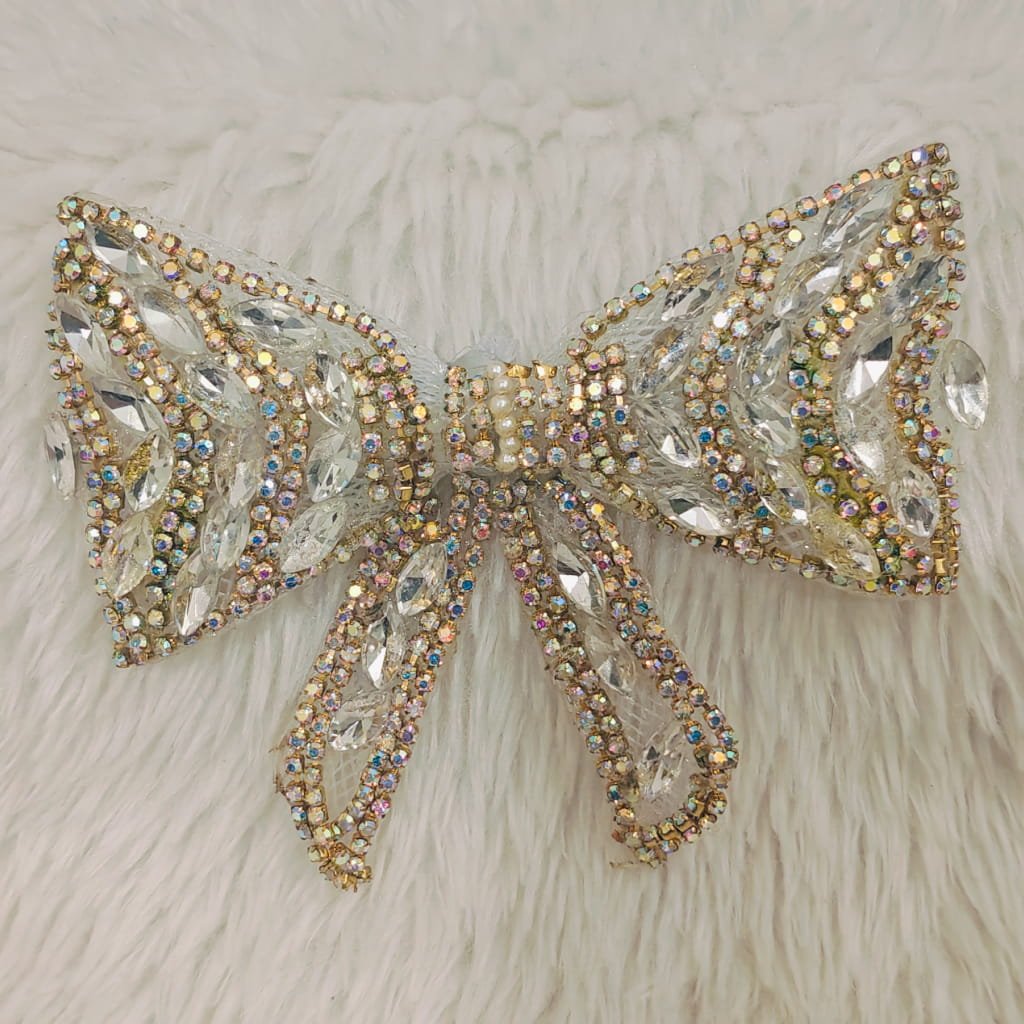 Crystal embellished luxury hair bow clip with rhinestones and pearl detailing for bridal and party wear hairstyles