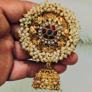 Traditional South Indian gold-finish Jada Billalu hair accessory with pearl detailing and red-green stone embellishments for bridal hairstyles