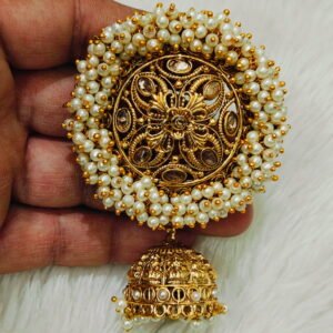 Traditional pearl Jada Billa hair accessory with gold finish and hanging jhumka, used for South Indian bridal braid decoration